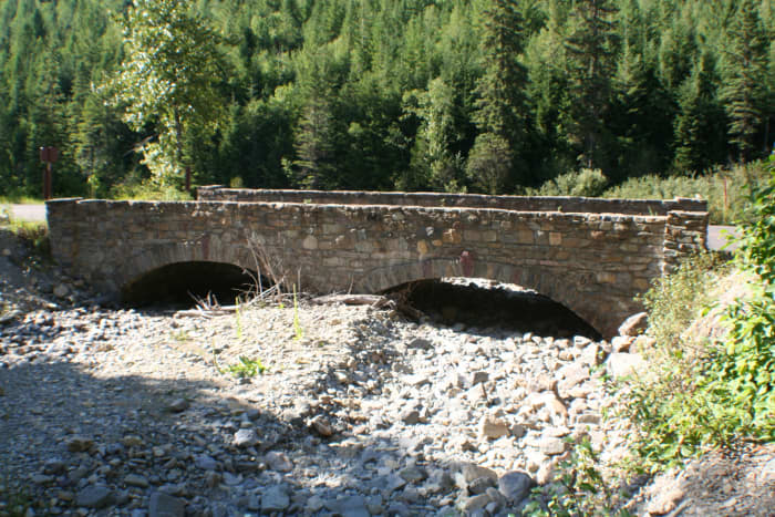 Old stone bridge near Haystack Creek for snow melt runoff
