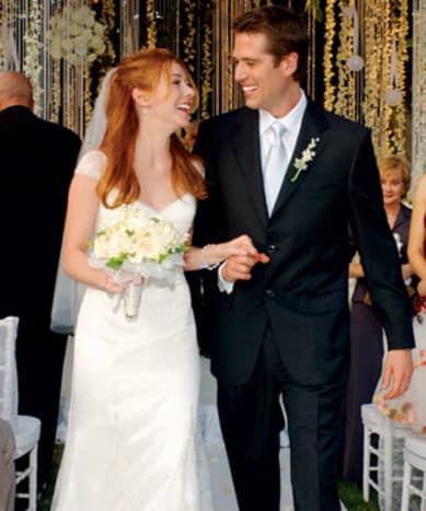From co-stars to lovers; Alyson Hannigan and Alexis Denisof at their wedding in 2003.