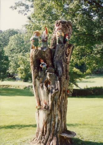 Note many little elves (nisse) on the tree log at Little Norway.