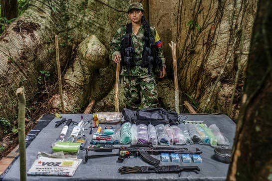 Typical armament a woman guerrilla of the FARC carries.