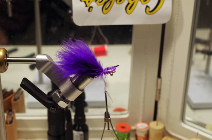 Place Marabou Plume #2 at the midpoint of the hook shank and secure with thread wraps