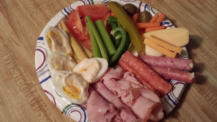 Celery sticks, Hard boiled egg, pickle, cheese, variety of cold cuts ie: chicken, ham, turkey, salami, carrots