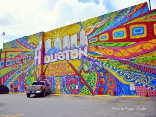 Mural at 420 Travis Street in Houston by Aerosol Warfare