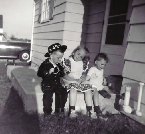 My brother John (in the cowboy outfit), me and my brother Jim.  Back then they were called Johnny and Jimmy.