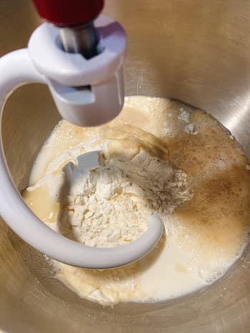 Combine the flour and salt in the bowl of a standing mixer.