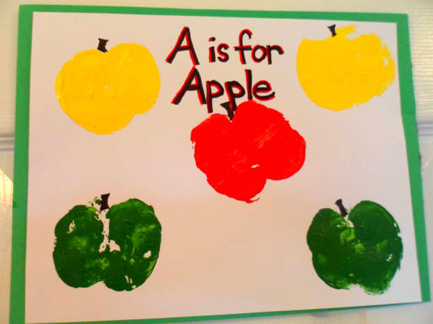 This is our finished piece of apple stamp art.