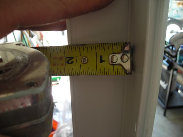 MEASURE THE DISTANCE FROM THE FLANGE TO THE INTERIOR FRAME