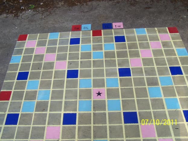 Outdoor Scrabble board on concrete