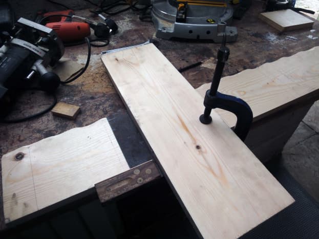 Using piece of wood as a guide for the Router