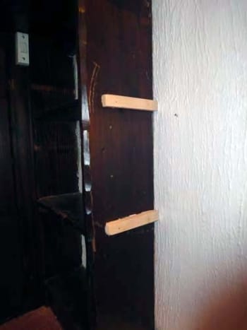 Fixing two batons to one side for shelf supports