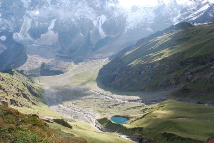 A view of beautiful blue Beas Kund or lake formed from the many streams from the Beas glacier before becoming Beas River 