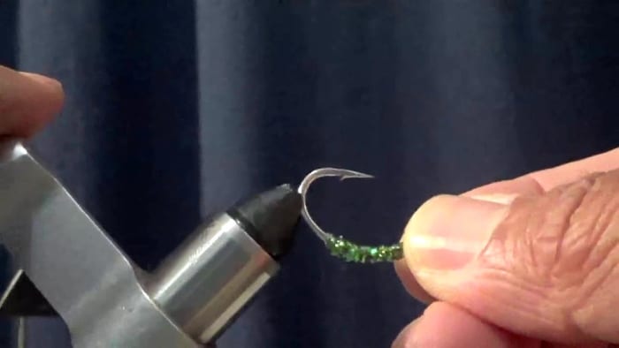 Flip the hook over and set in the tying vice as shown