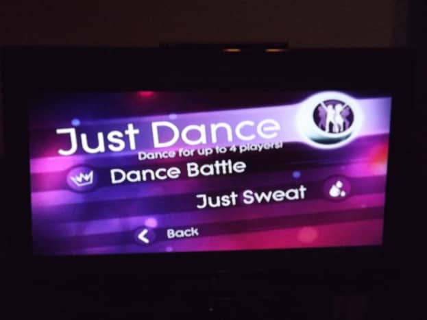 Opening screen for Just Dance 2 on the Wii.