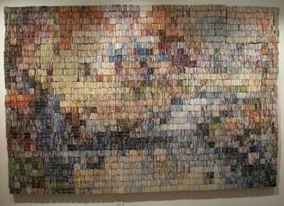 This piece is 8 ft x 5 ft and includes about 40,000 pieces of junk mail.