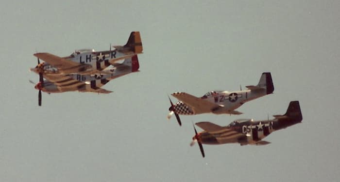 A flight of P-51s at an Andrews AFB open house.