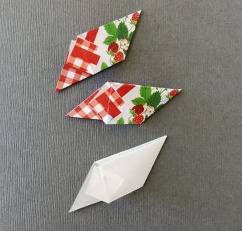 Fold two squares of your pattern and a square of vellum for the template.