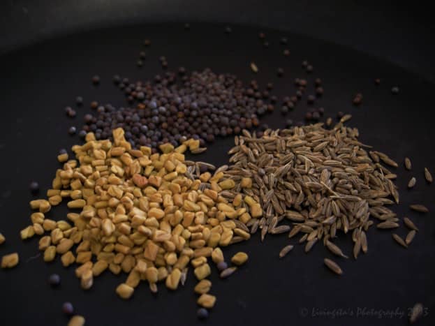 Clockwise from bottom left: Fenugreek seeds, Mustard seeds, Cumin seeds