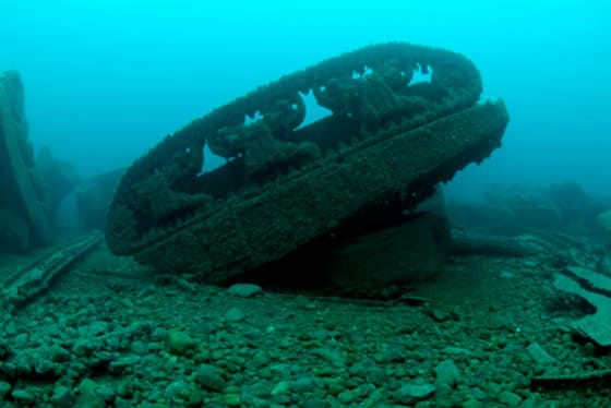 military-warship-tank-airplane-graveyard-under-the-sea-sunken-wwii-hardware