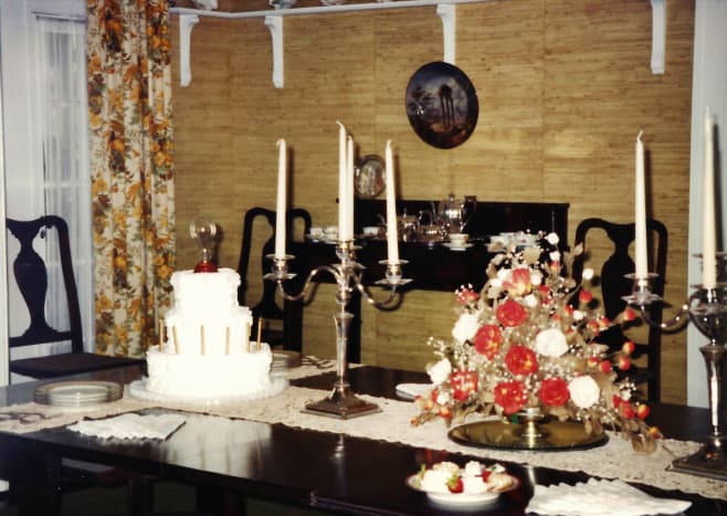 Note the cake with lightbulb on the Edison dining table.
