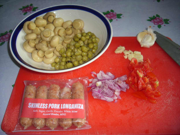 Some of the ingredients:  Longganisa, mushrooms, peas, onion, tomato and garlic.