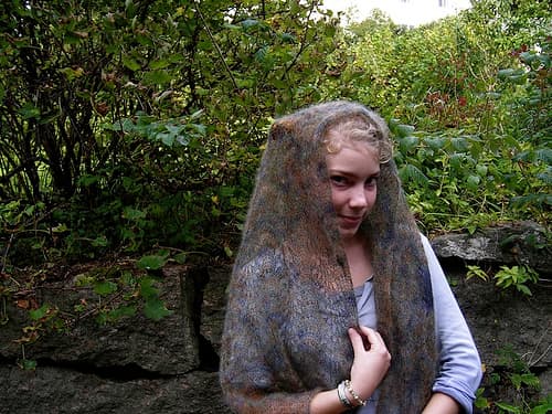 Lacy shawls make demure (but sweetly sexy) headcoverings. 