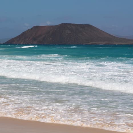 This is Isla de Lobos, a small undeveloped island and nature reserve off the northeast coast of Fuerteventura near Correlejo. It can be visited by boat on a day trip