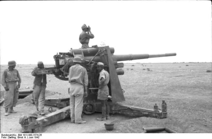 88mm anti-tank gun in position at Bir Hakeim, North Africa, June 1942. Rommel would screen his minefields with his deadly 88mm guns decimating enemy tank divisions as they tried to break his line of defense. 
