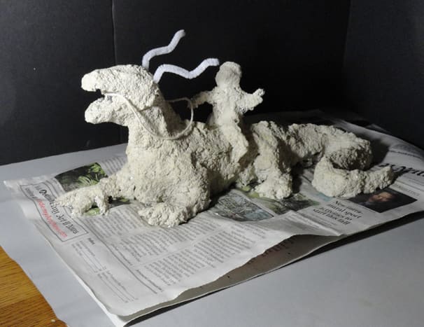 I created a clay model of the dragon and boy to help with placement of shadows.  Sometimes this helps the drawing process.