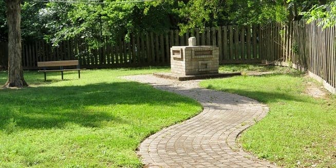 Paved path to the Tri-County Marker in Thomas Park