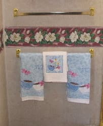 Once we've enjoyed our family Christmas, we pack the seasonal towels. Mom's trailer is decorated in a teapot/teacup theme in honor of her lifelong hobby of collecting teacups. 