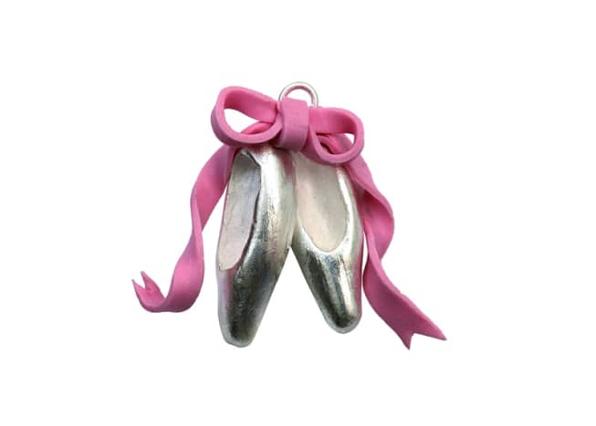 Silver ballet slipper charms are perfect for ballet aficionados or aspiring ballerinas! Make the ribbons from pink polymer clay, if you like.