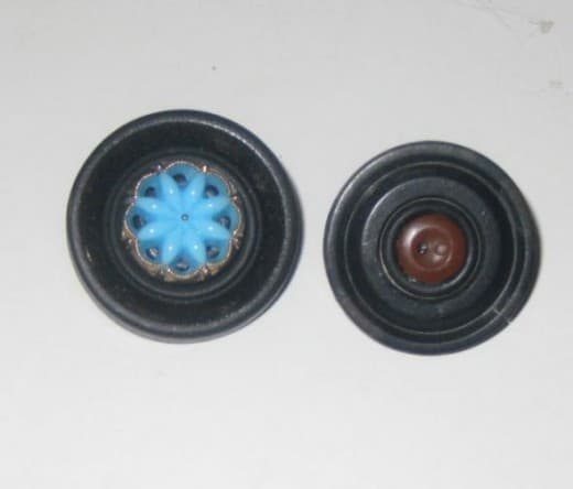 Vintage buttons glued together to make a brooch.