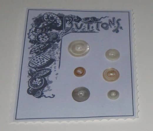 Display buttons on a decorative card.