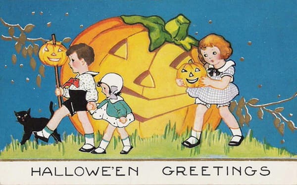 Free vintage Halloween card: children and large carved pumpkin