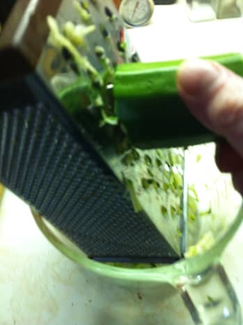 You can use a food processor for grating the zucchini but I chose to do it manually. 