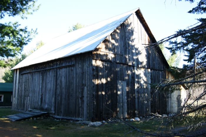 The wood siding of old barns was sometimes left natural and would weather to a beautiful silver/grey.
