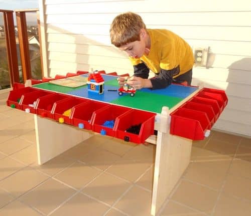 This DIY Lego Table was hand crafted and the bins added to all the sides to allow for EASY Lego Storage as well as sorting all the pieces.
