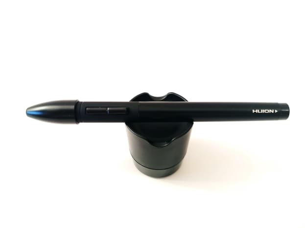 Capped battery-free stylus put on display on the pen stand.