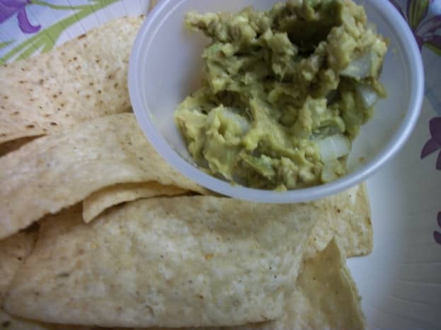 Guacamole made with avocado with chopped sweet onion