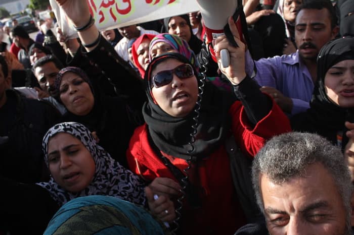 Egyptian women in protest on International Women's Day, wearing the ameera and the shayla style veils - both examples of an hijab