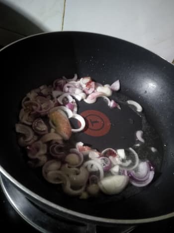 First Step: pour oil and stir fry chopped red onions