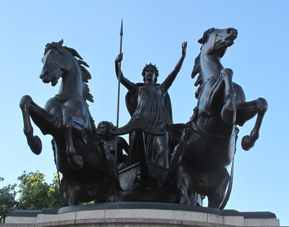 Statue of Boudicca, erected 1902, stands guard along the River Thames in London across from Big Ben and Westminster Bridge.