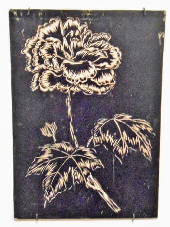 Flower with leaves inked print block image.