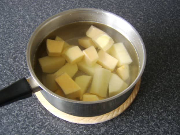 Chopped potato and swede ready to be boiled