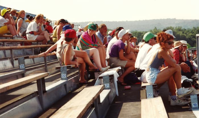 Other people in the bleachers watching the Olympic dressage event in 1992 outside of Barcelona.