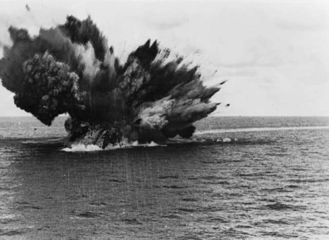The HMS Barham's magazine exploding.