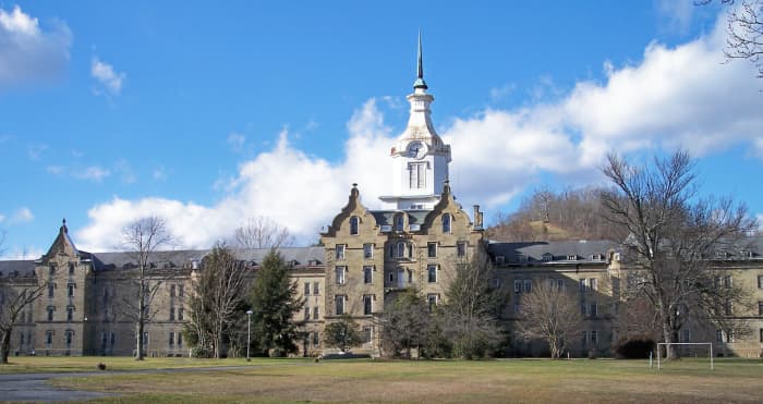 The Trans Allegheny Lunatic Asylum's construction started in 1858 and was not completed until 1881.  The mental institution was forcibly shut down in 1994, when patient treatment regulations were implemented. 
