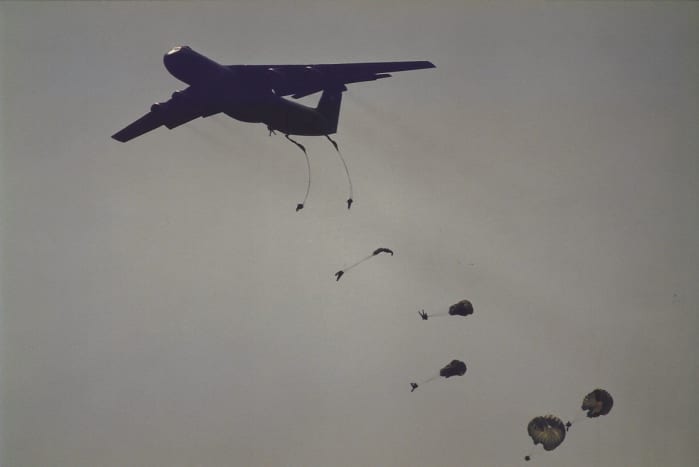 Paratroopers jumping from a C-141B, Joint Base Andrews, MD.