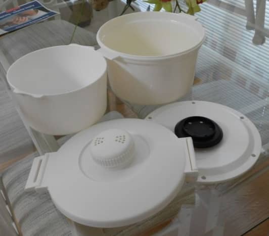 These are the four section of the Nordic Ware Steamer and Cooker