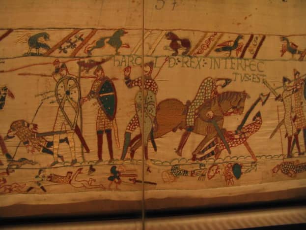 Bayeux Tapestry depicts scenes from the 1066 Battle of Hastings and the start of the Norman Conquest in England.